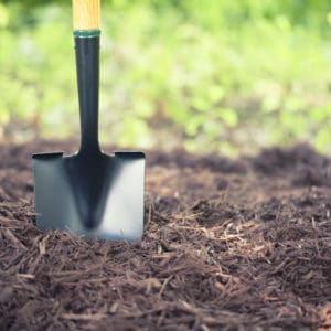 Mulch with shovel